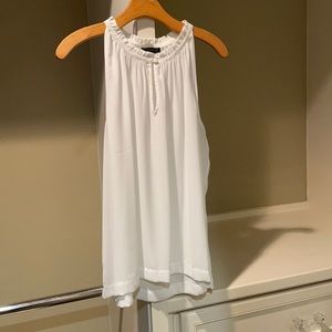 Ivory high necked sleeveless shell